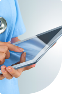 Doctor Looking at a Tablet Computer Doctor Looking at a Tablet Computer