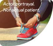 Person Tying Their Shoelaces Before A Run Person Tying Their Shoelaces Before A Run